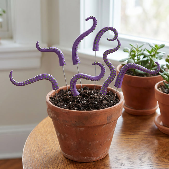 Explicación de decoración de maceta con tentáculos púrpura